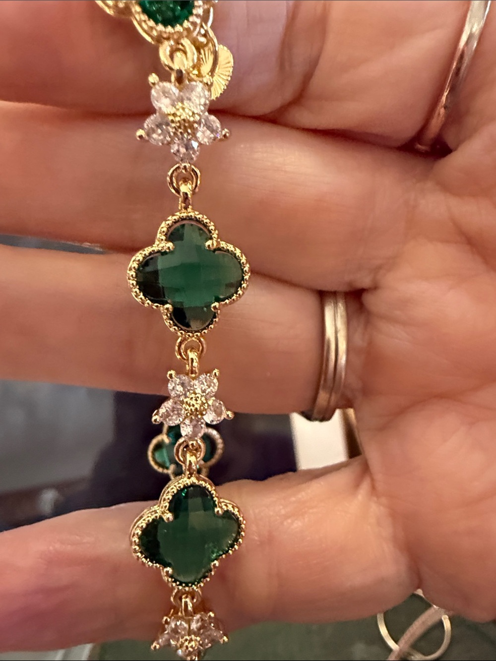 Gold Plated Bracelet with Emerald Green Clover Stones and Clear Accents